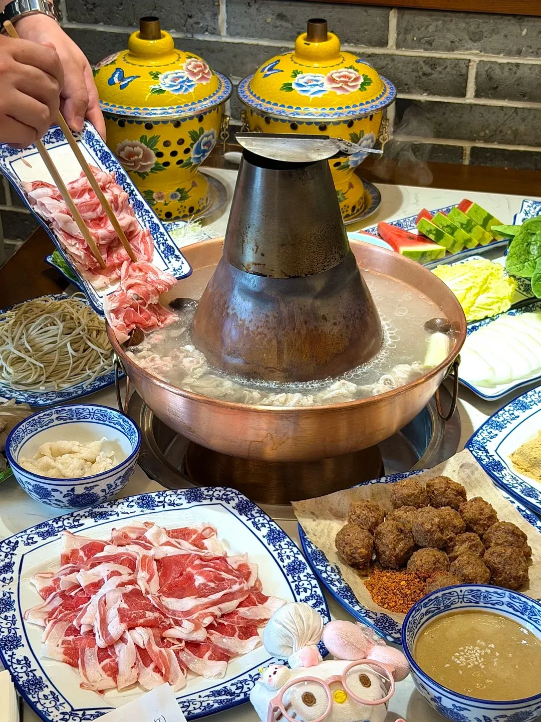 Copper pot hotpot with lamb and sides