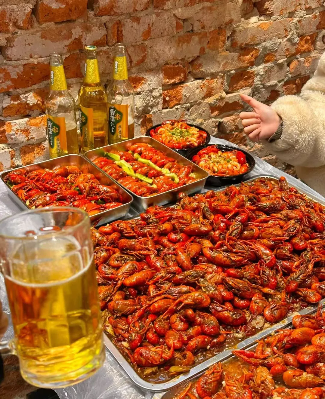 Trays of spicy crayfish with beer