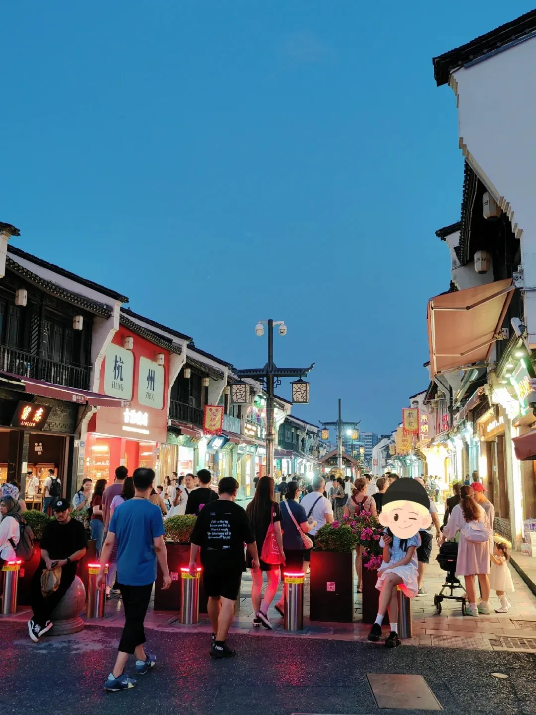 Crowded Hefang Street with traditional architecture and shop signs