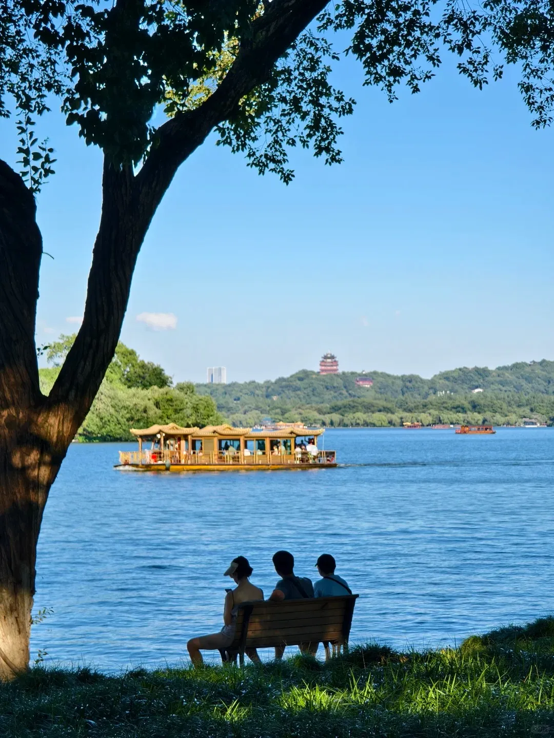 Causeway and lakeside scenery at West Lake in Hangzhou
