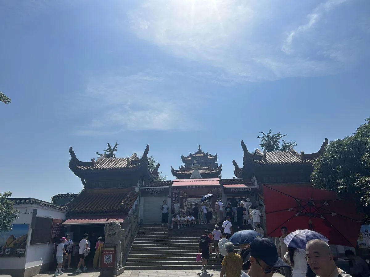 Visitors at the entrance to Yellow Crane Tower Park in Wuhan